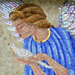 Detail of angel holding dove